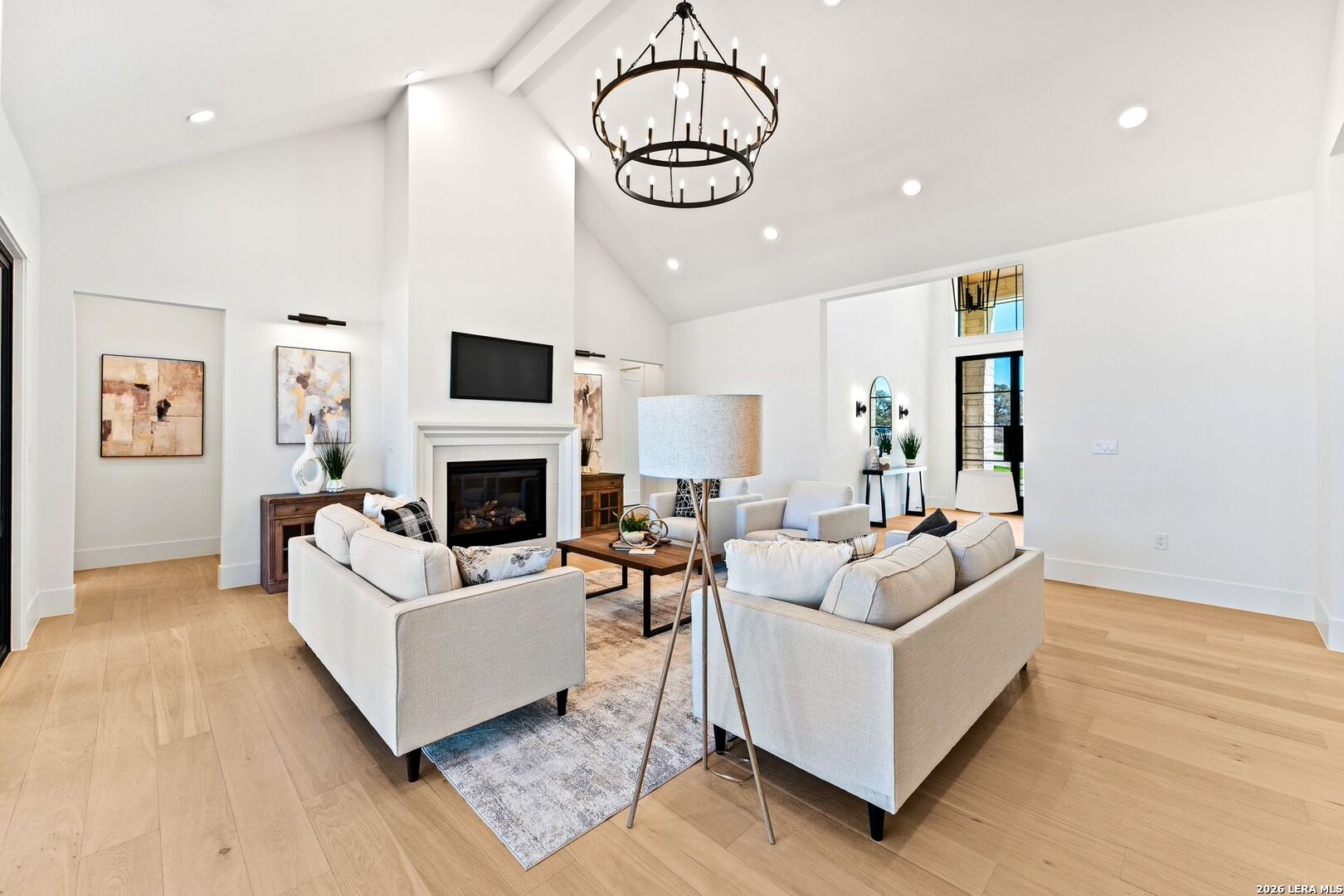 34793 High Gate Road Bulverde, TX 78163 - Photo 8 of 50 a living room with furniture fireplace and a flat screen tv