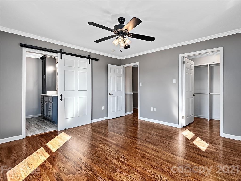588 Lee Cudd Road Rutherfordton, NC 28139 - Photo 12 of 42 a view of empty room with wooden floor