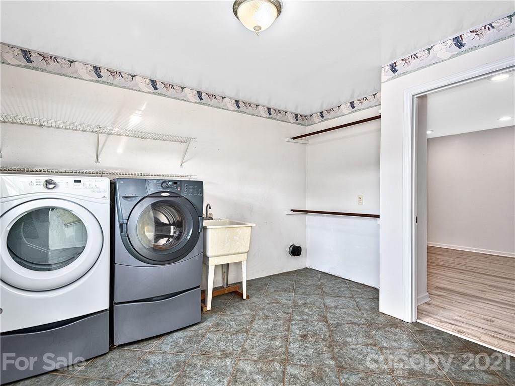 588 Lee Cudd Road Rutherfordton, NC 28139 - Photo 19 of 42 a utility room with dryer and washer