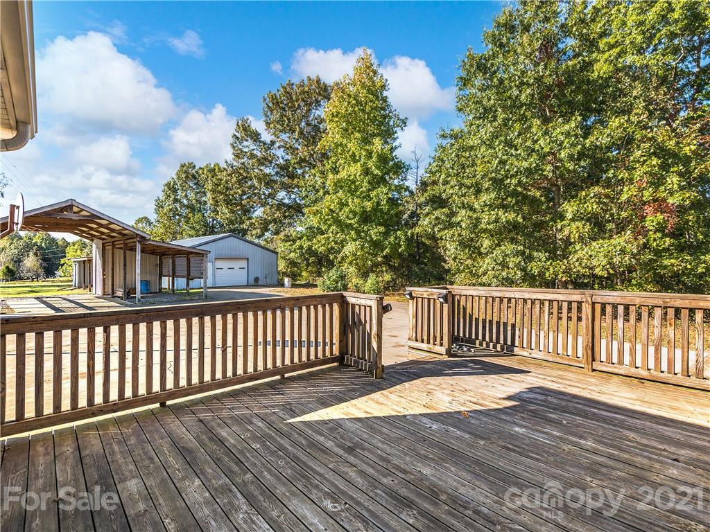 588 Lee Cudd Road Rutherfordton, NC 28139 - Photo 29 of 42 a view of a wooden roof deck