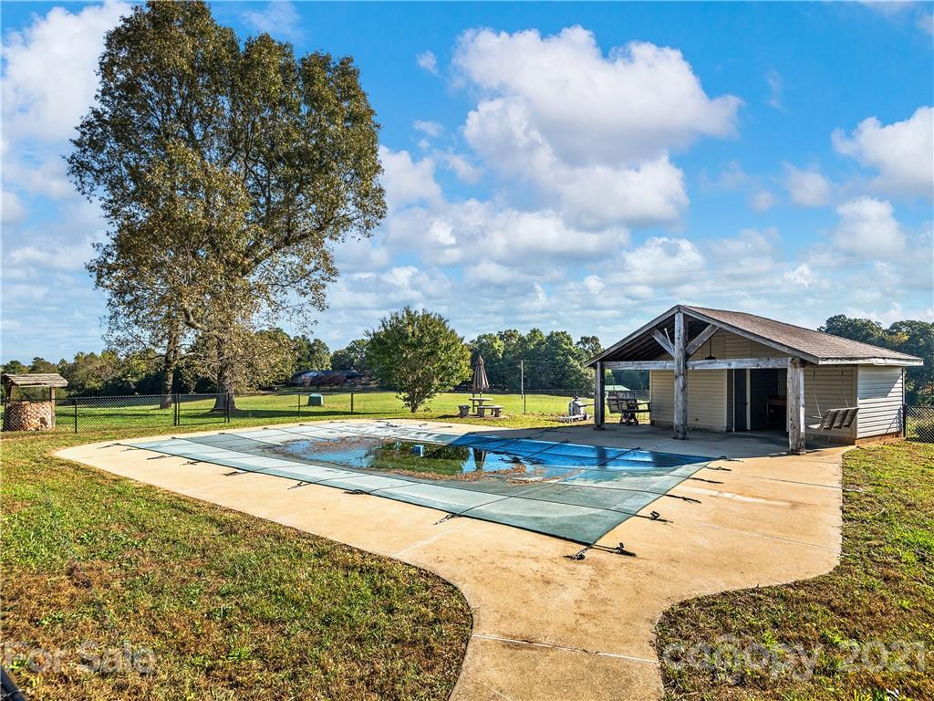 588 Lee Cudd Road Rutherfordton, NC 28139 - Photo 31 of 42 a view of a house with swimming pool and sitting area