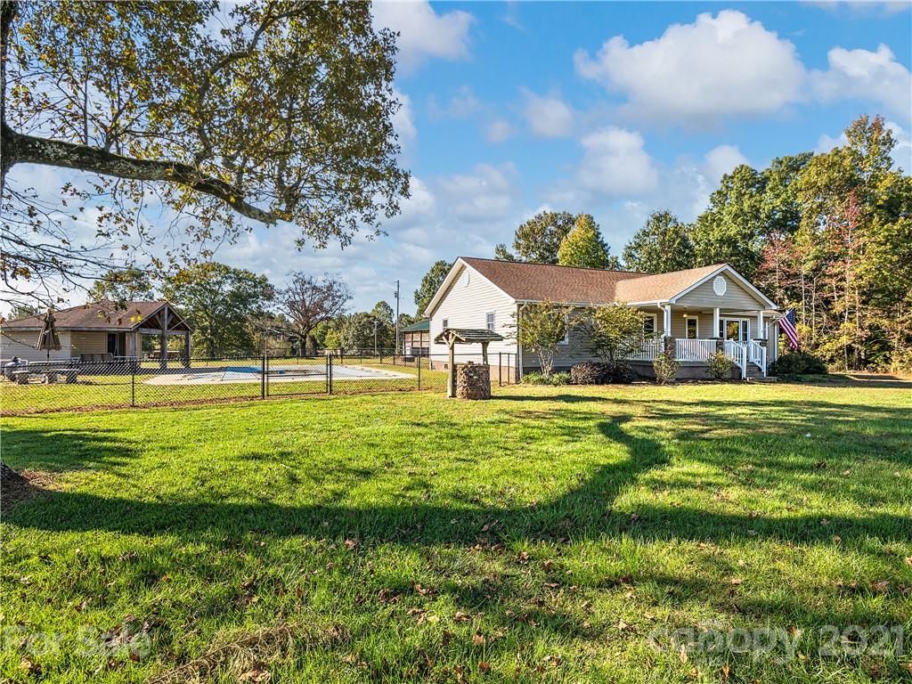 588 Lee Cudd Road Rutherfordton, NC 28139 - Photo 33 of 42 a front view of house with yard and green space