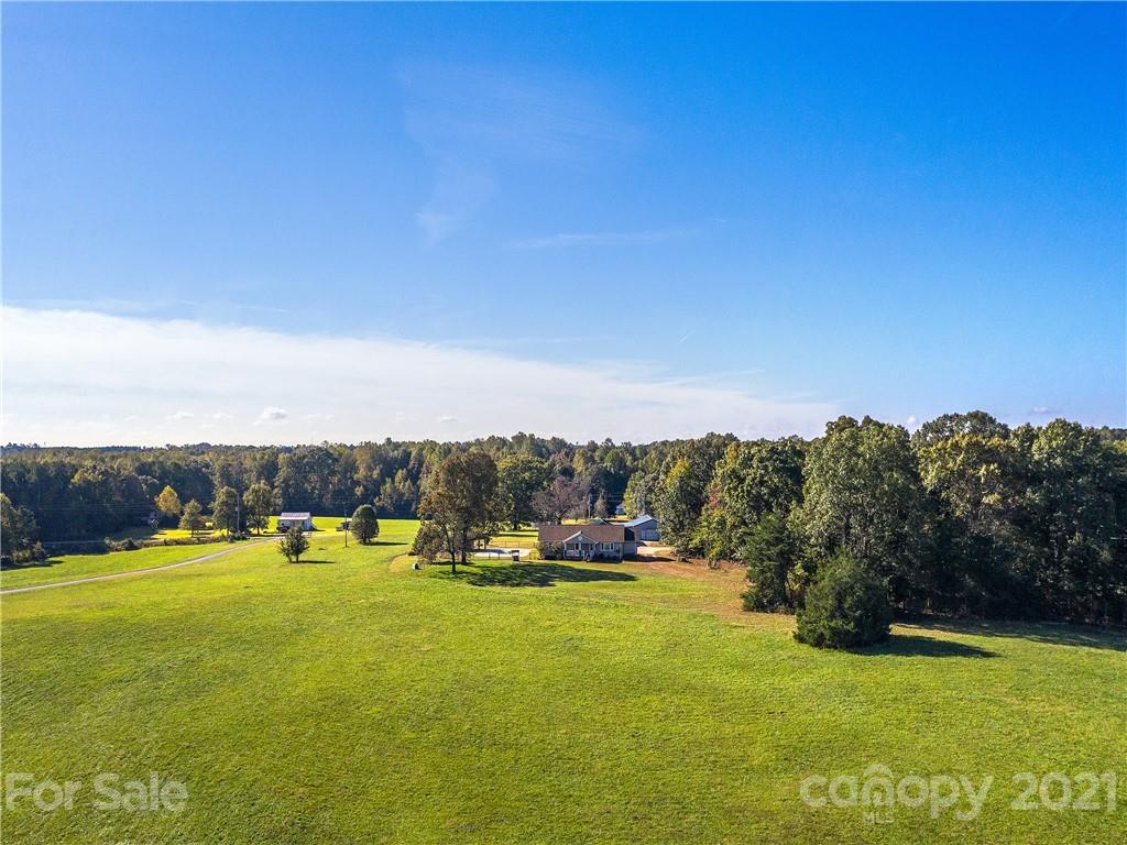 588 Lee Cudd Road Rutherfordton, NC 28139 - Photo 41 of 42 a view of a swimming pool with an ocean and mountain view