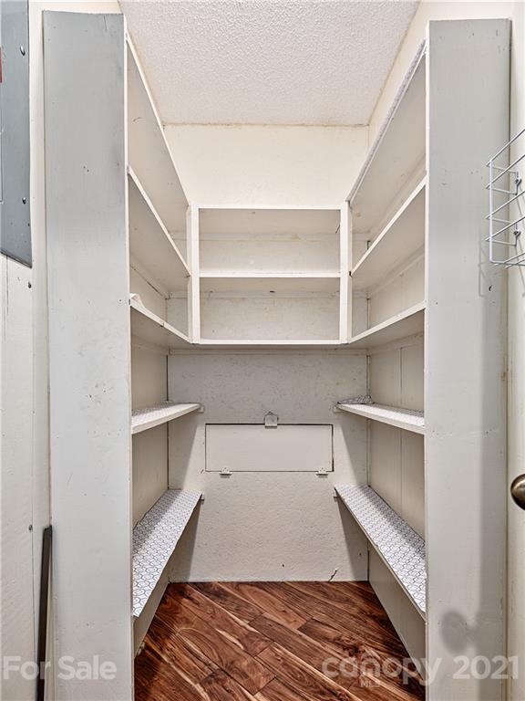 588 Lee Cudd Road Rutherfordton, NC 28139 - Photo 7 of 42 a view of walk in closet with empty racks
