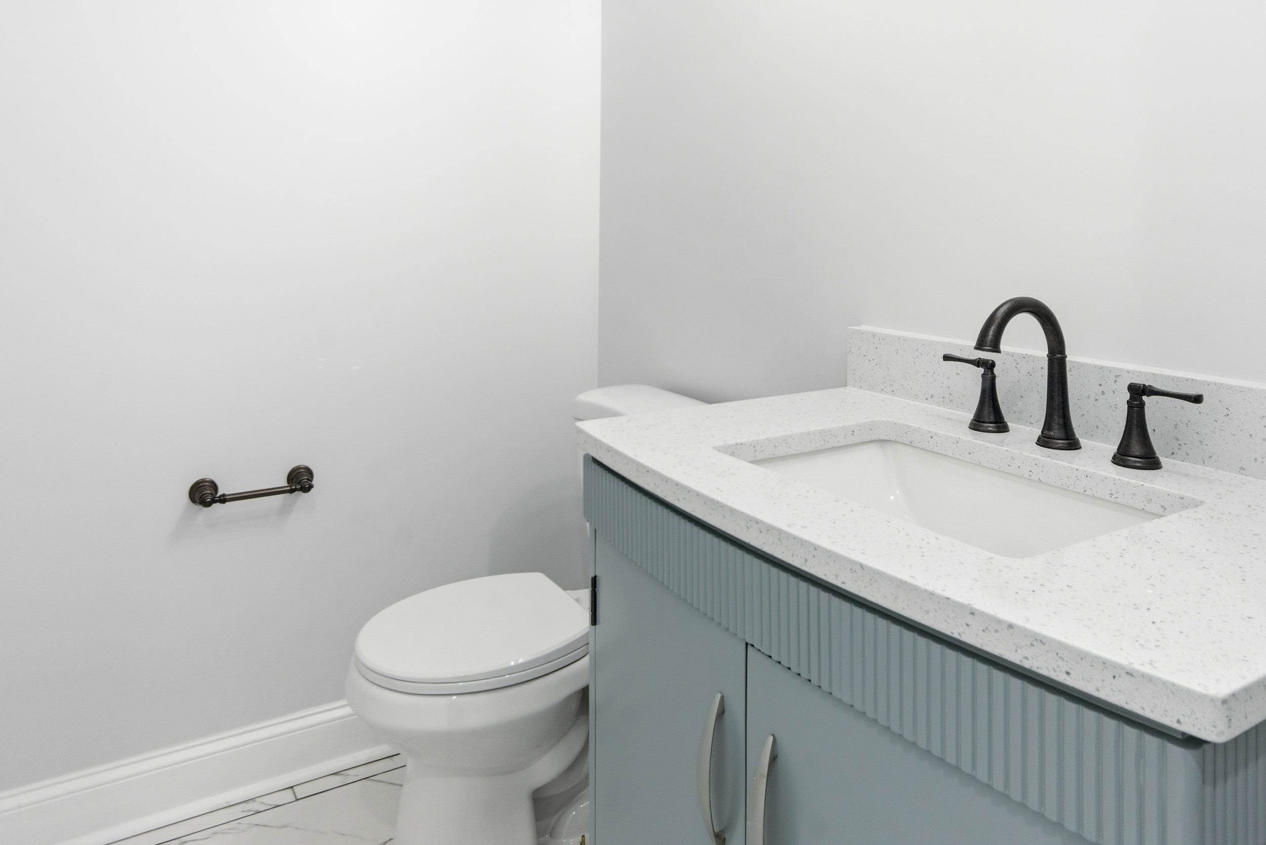 11080 Shelby Post Road Collierville, TN 38017 - Photo 12 of 39 Bathroom with vanity and marble look tiles