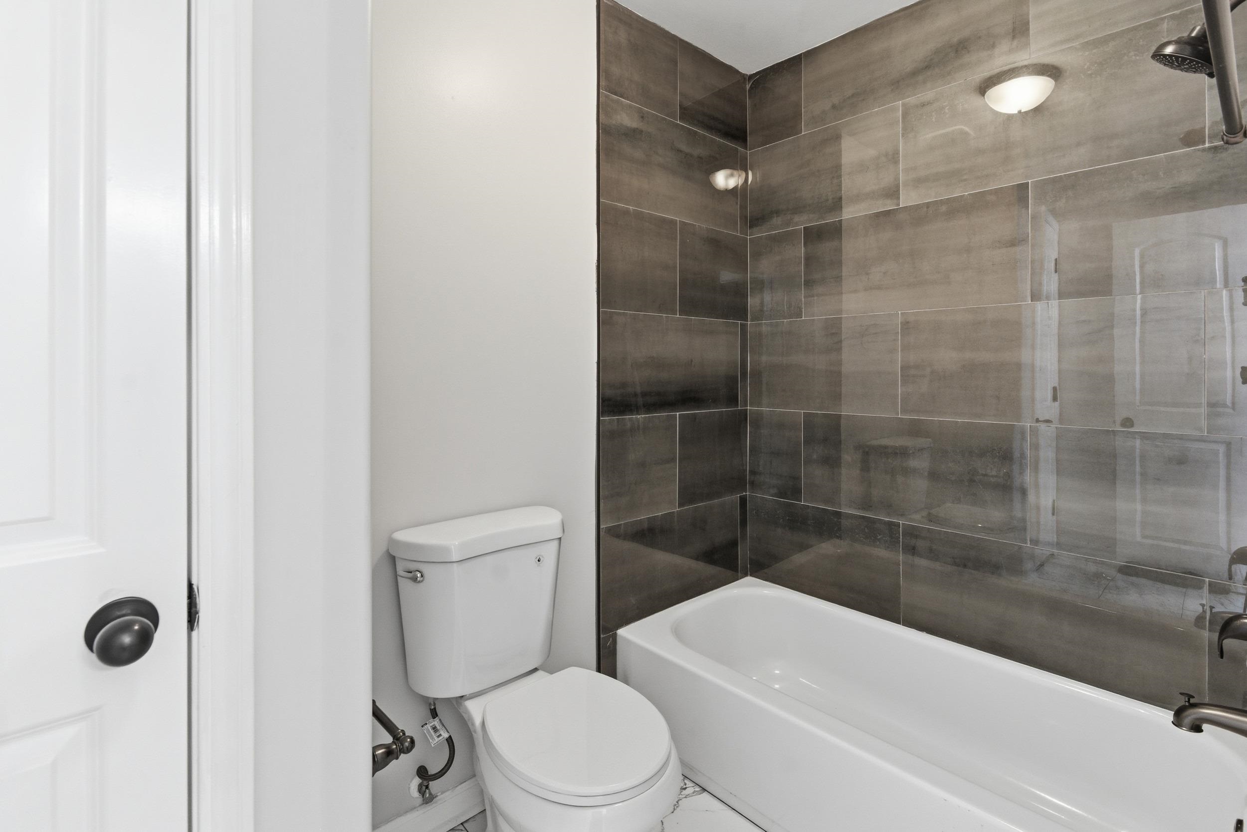 11080 Shelby Post Road Collierville, TN 38017 - Photo 29 of 39 Full bath with shower / washtub combination and toilet