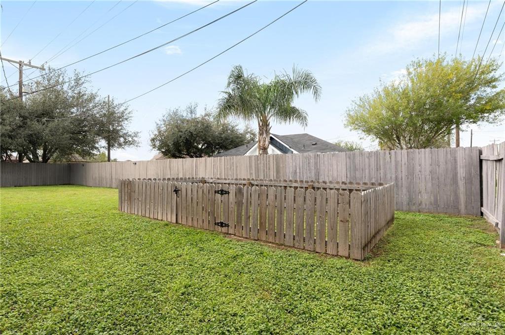 3505 Amando Street, Unit 3 Edinburg, TX 78539 - Photo 15 of 17 a view of a backyard with wooden fence