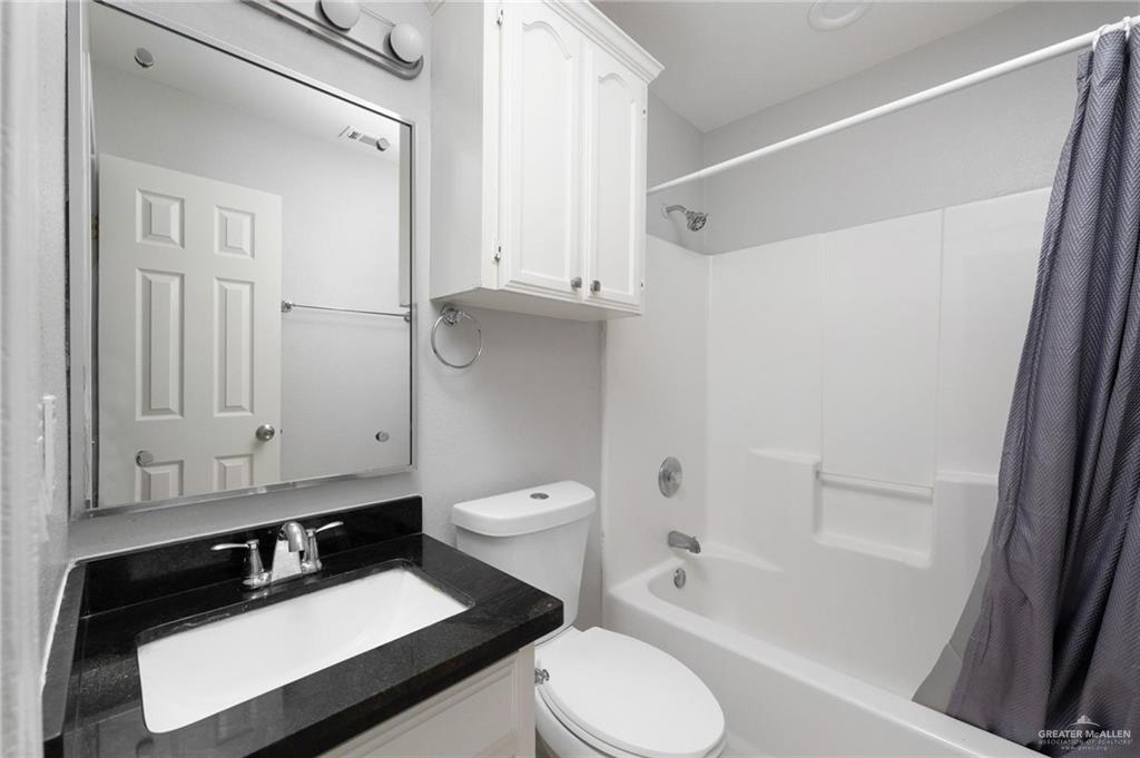 3505 Amando Street, Unit 3 Edinburg, TX 78539 - Photo 9 of 17 a bathroom with a sink a toilet and shower