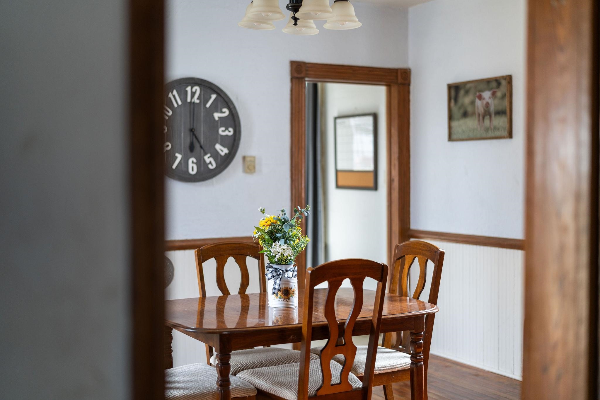 503 Augusta Avenue Grottoes, VA 24441 - Photo 18 of 61 a view of a dining room with furniture and wooden floor