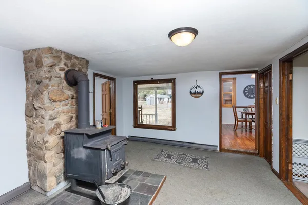 a bedroom with a bed and dresser
