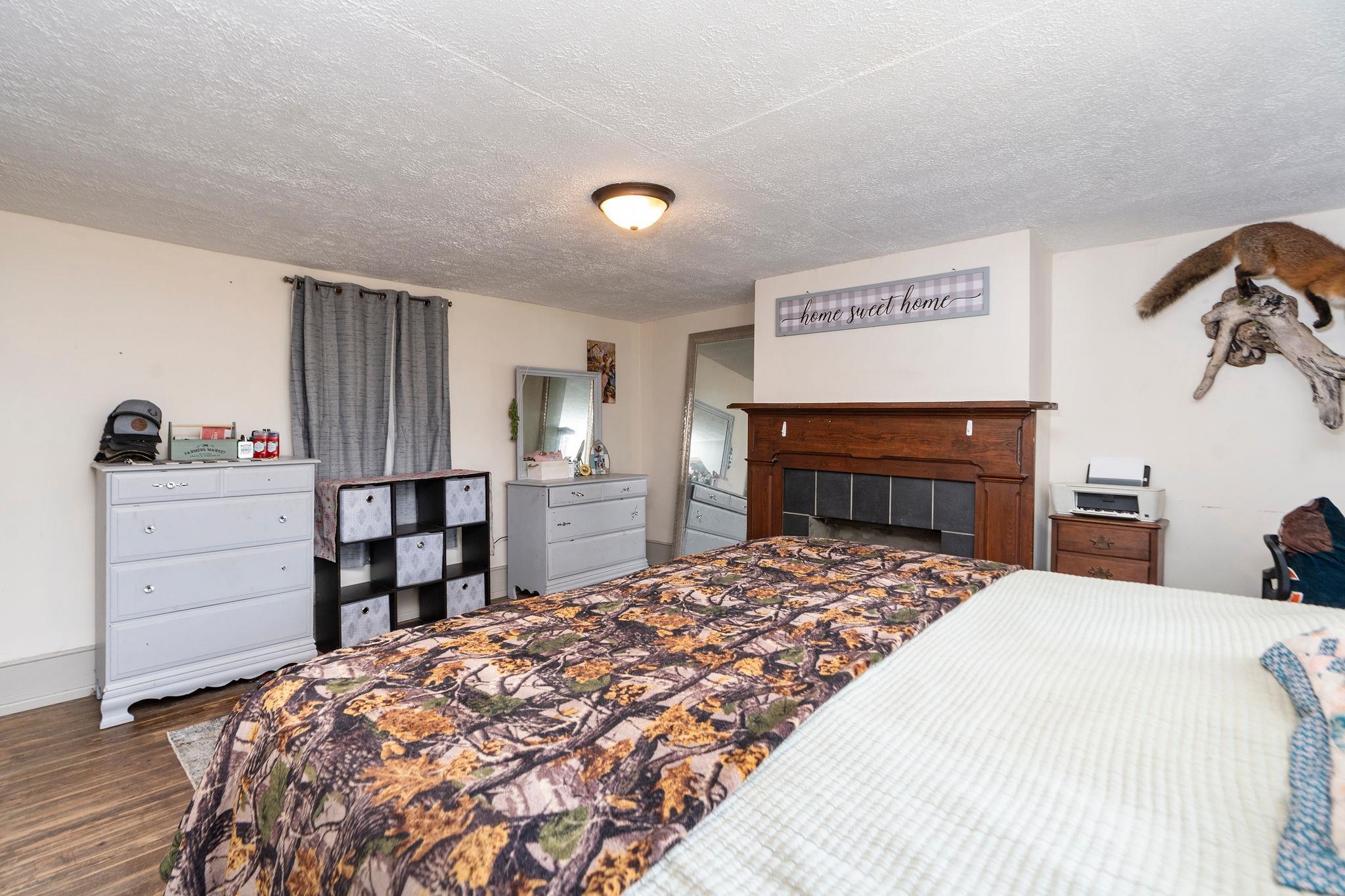 503 Augusta Avenue Grottoes, VA 24441 - Photo 32 of 61 a bedroom with a bed and dresser