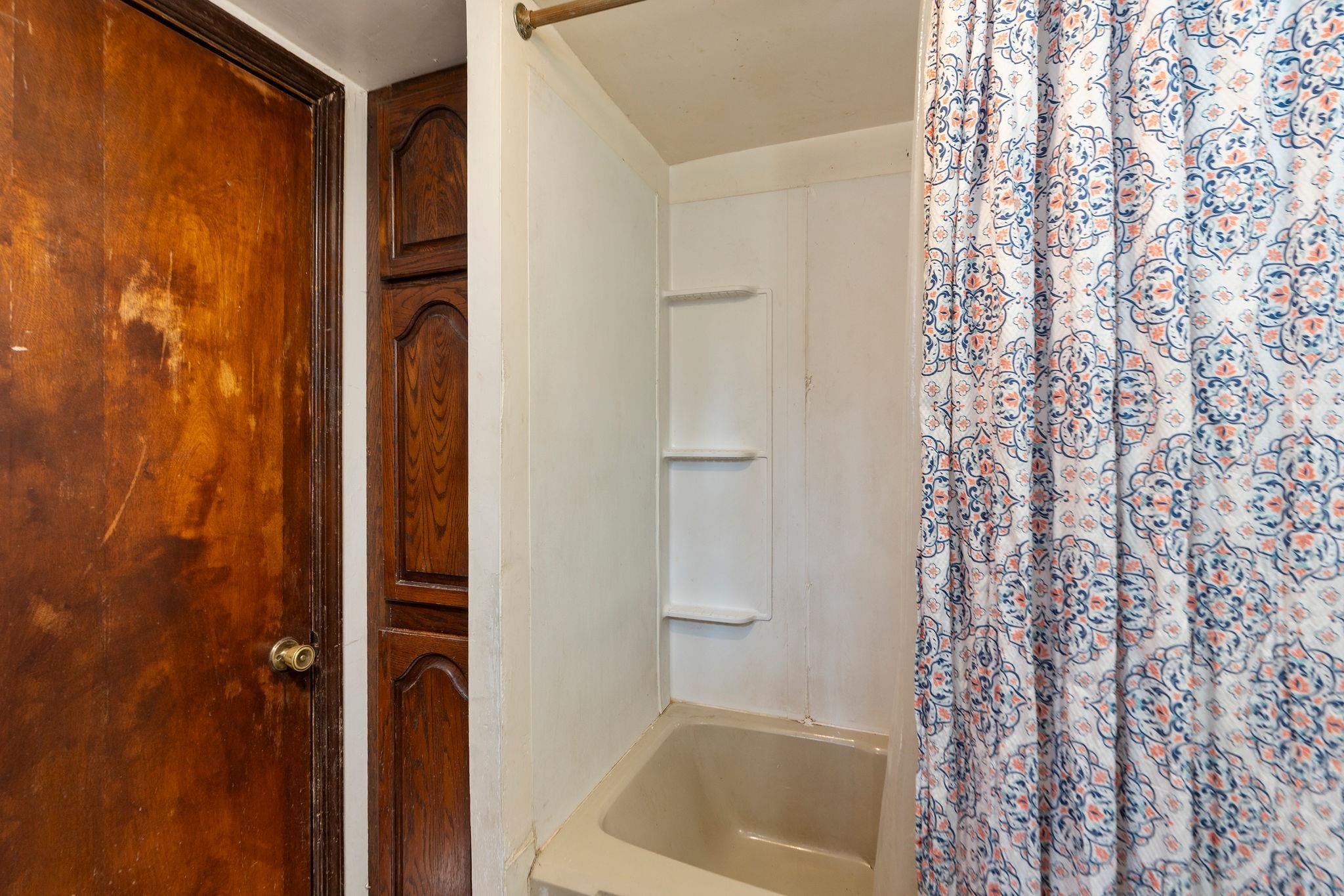 503 Augusta Avenue Grottoes, VA 24441 - Photo 37 of 61 a bathroom with a shower and a tub