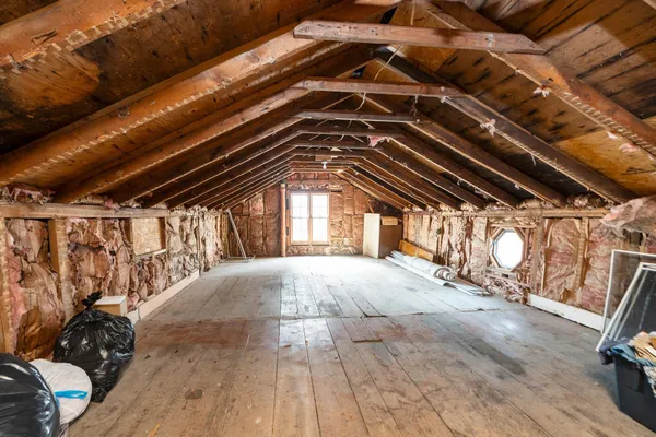 a view of empty space with large trees