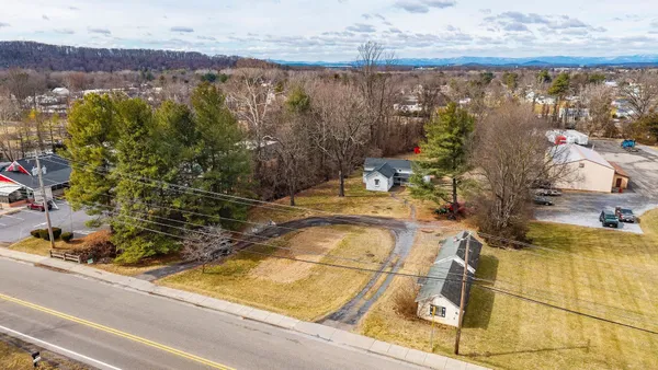 a view of swimming pool from a lake view