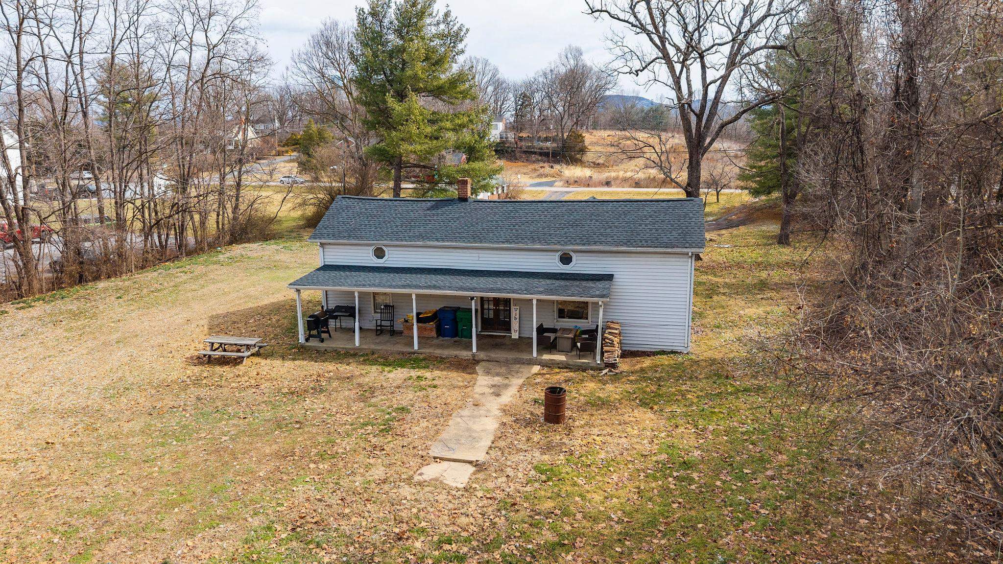 503 Augusta Avenue Grottoes, VA 24441 - Photo 42 of 61 front view of a house with a yard