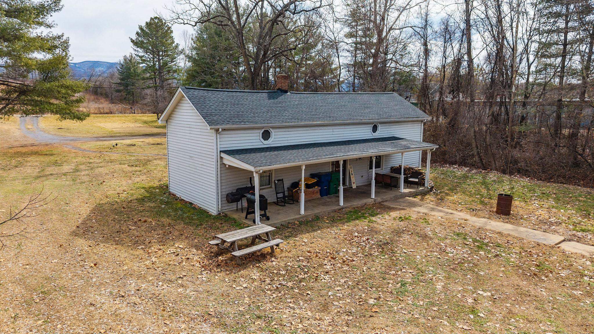 503 Augusta Avenue Grottoes, VA 24441 - Photo 43 of 61 a view of a house with a yard and sitting area