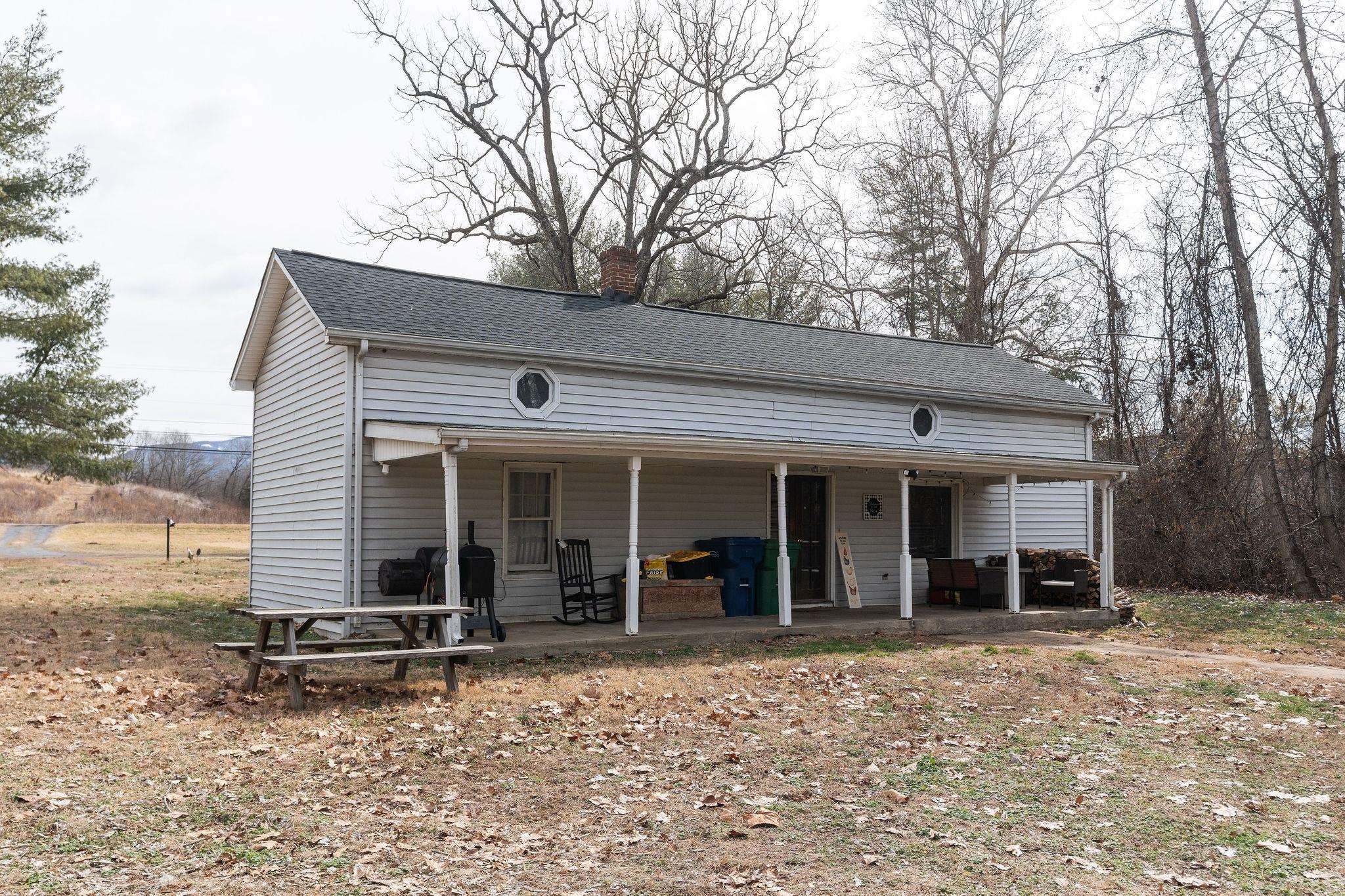 503 Augusta Avenue Grottoes, VA 24441 - Photo 48 of 61 a view of a house with a patio and a yard
