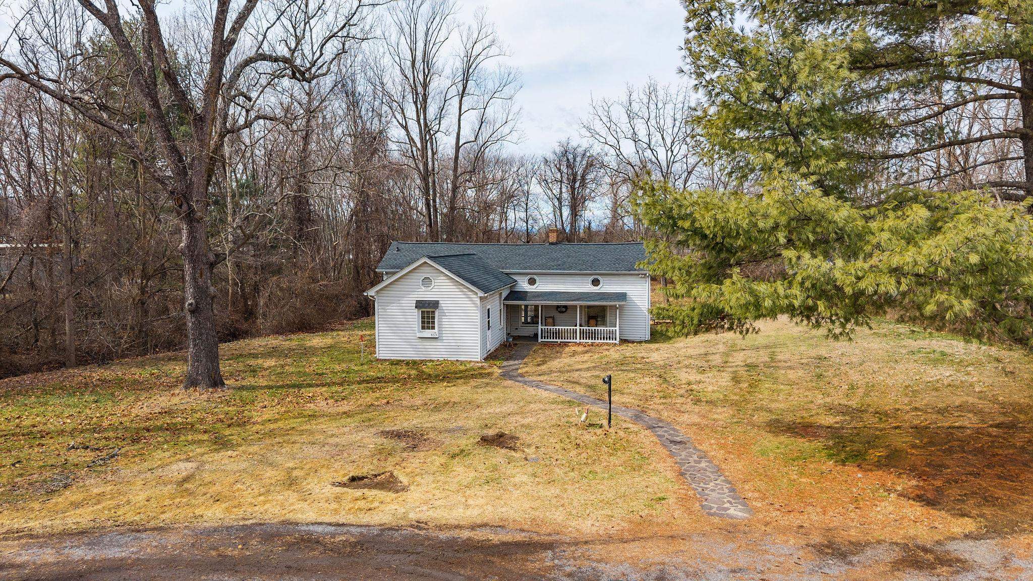 503 Augusta Avenue Grottoes, VA 24441 - Photo 5 of 61 a house that has a tree in front of it