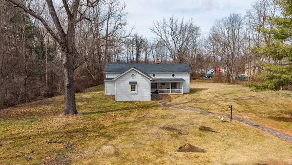 a house with trees in front of it