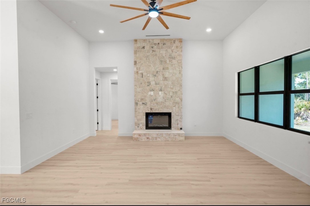 2310 Columbus Avenue Alva, FL 33920 - Photo 11 of 43 a view of an empty room with window and fireplace