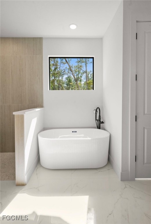 2310 Columbus Avenue Alva, FL 33920 - Photo 35 of 43 a white tub sitting next to a window