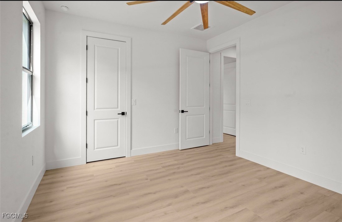 2310 Columbus Avenue Alva, FL 33920 - Photo 37 of 43 a view of an empty room with wooden floor