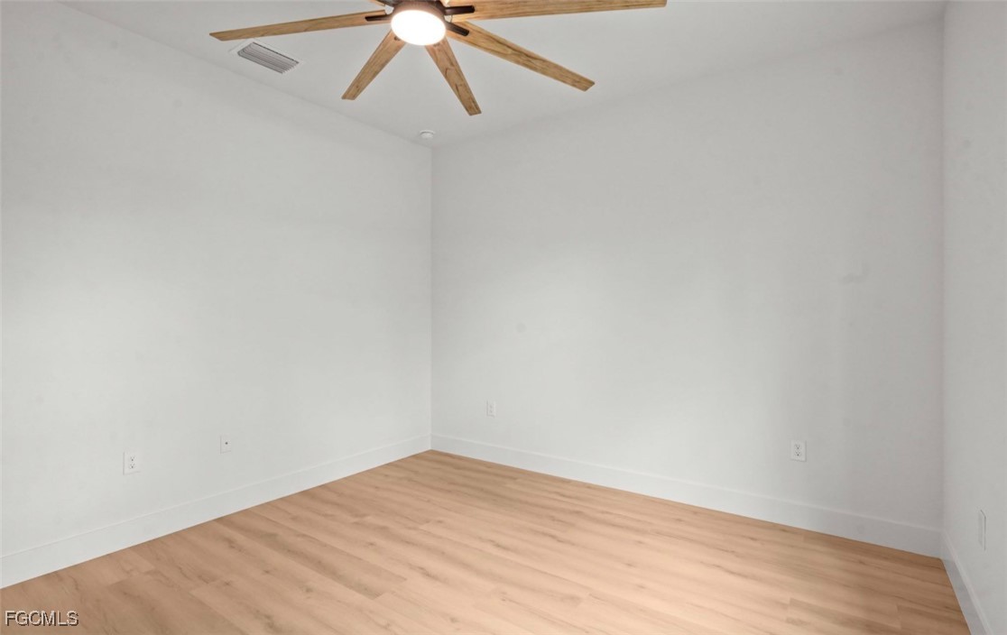 2310 Columbus Avenue Alva, FL 33920 - Photo 43 of 43 an empty room with a window and a fan