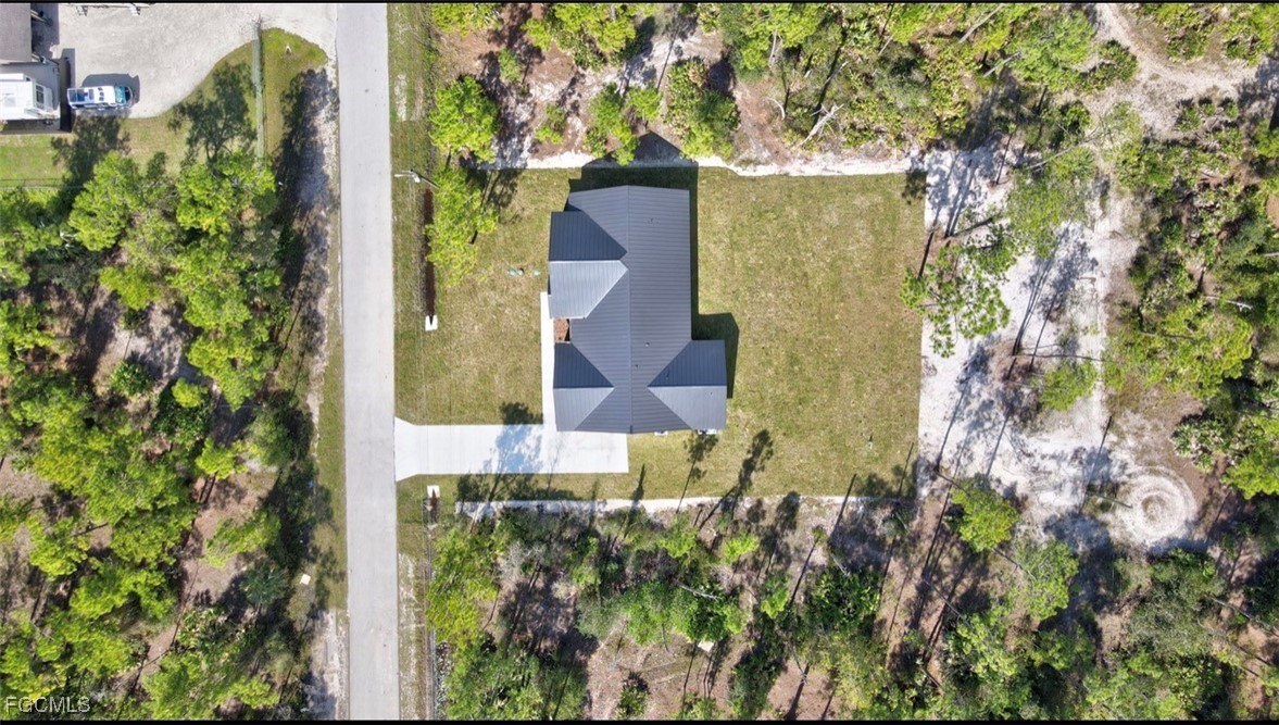 2310 Columbus Avenue Alva, FL 33920 - Photo 8 of 43 an aerial view of a residential houses with yard