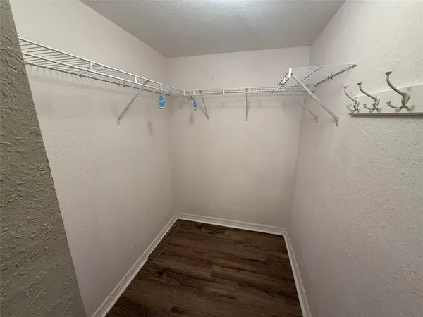 a view of a room with racks on the wall