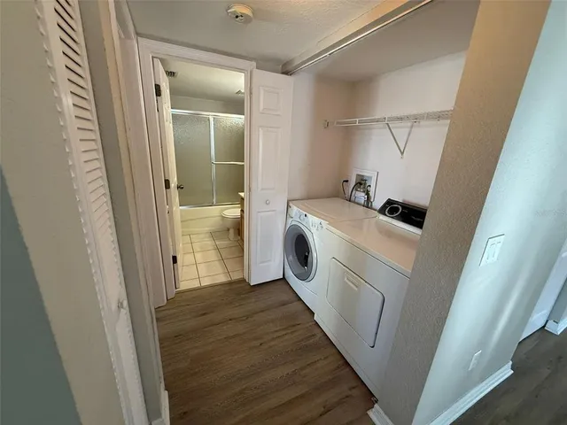 a utility room with dryer and washer