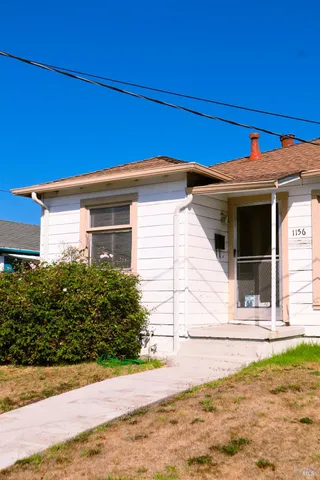 a view of the house and garage