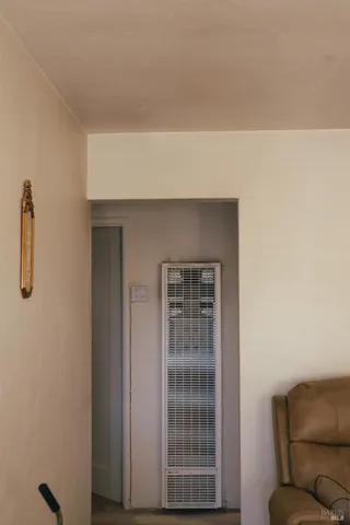 a kitchen with a sink cabinets and window