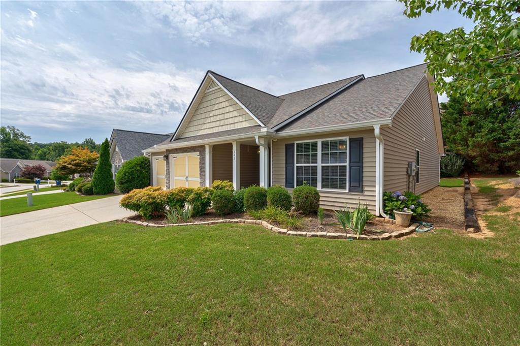 245 Memory Lane Winder, GA 30680 - Photo 61 of 62 a view of a house with backyard sitting area and garden