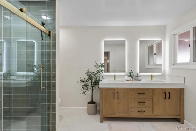 a bathroom with a shower and toilet