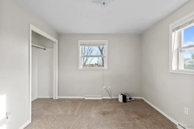 an empty room with a workspace