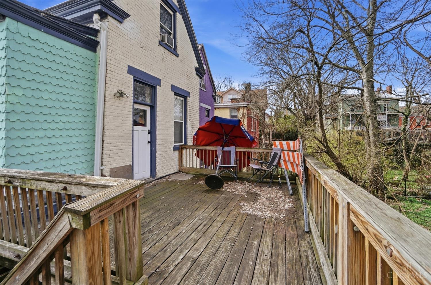 46 Graham Street Cincinnati, OH 45219 - Photo 10 of 22 Second floor back deck and access to Unit 2 (3 bed, 1 full bath), if renting as 2 units.