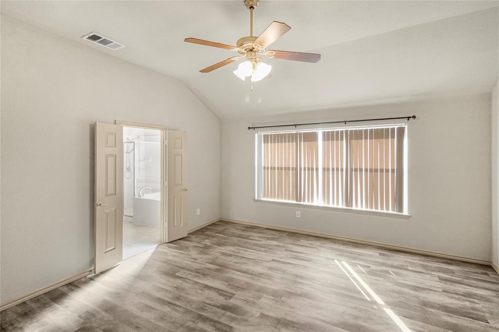 10033 Butte Meadows Drive Fort Worth, TX 76177 - Photo 23 of 31 a view of an empty room with a window