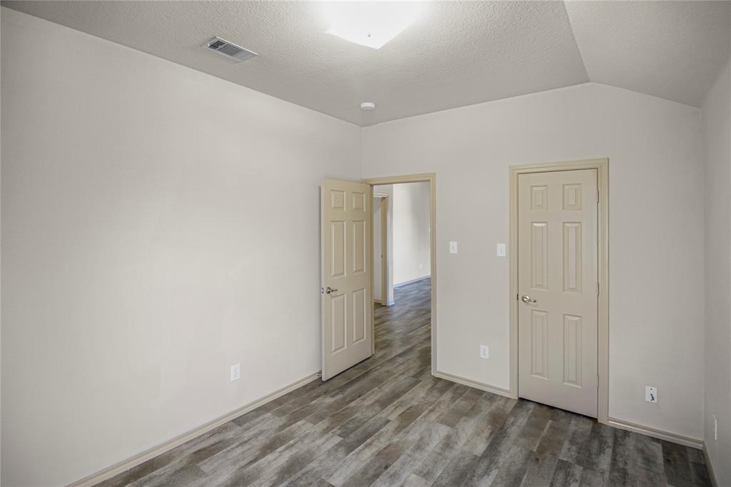 10033 Butte Meadows Drive Fort Worth, TX 76177 - Photo 29 of 31 wooden floor in an empty room