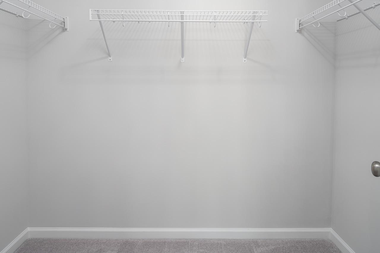 1434 Rosepine Drive Cary, NC 27519 - Photo 20 of 32 a view of small space with racks on the wall