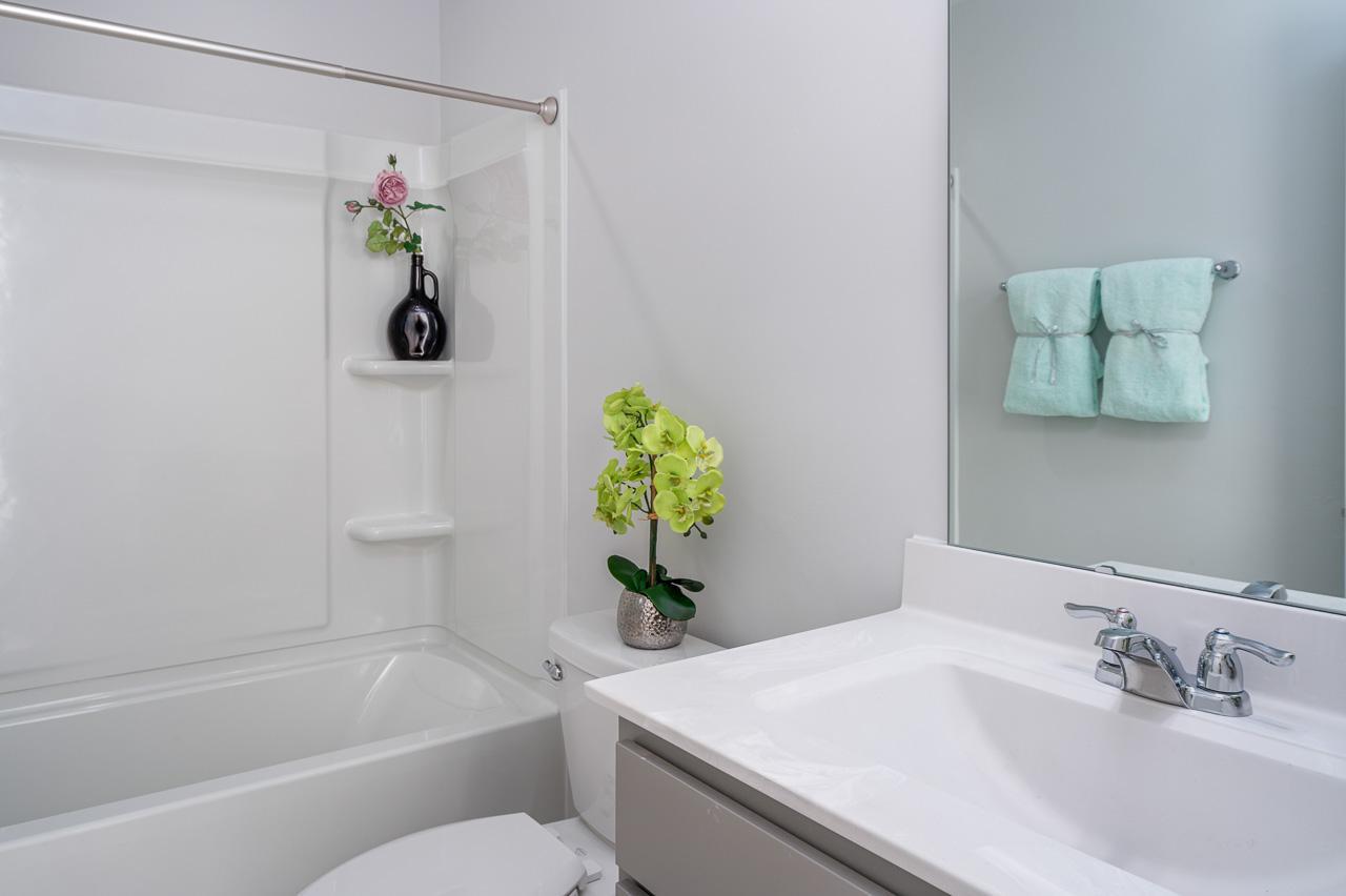 1434 Rosepine Drive Cary, NC 27519 - Photo 29 of 32 a bathroom with a sink and bathtub