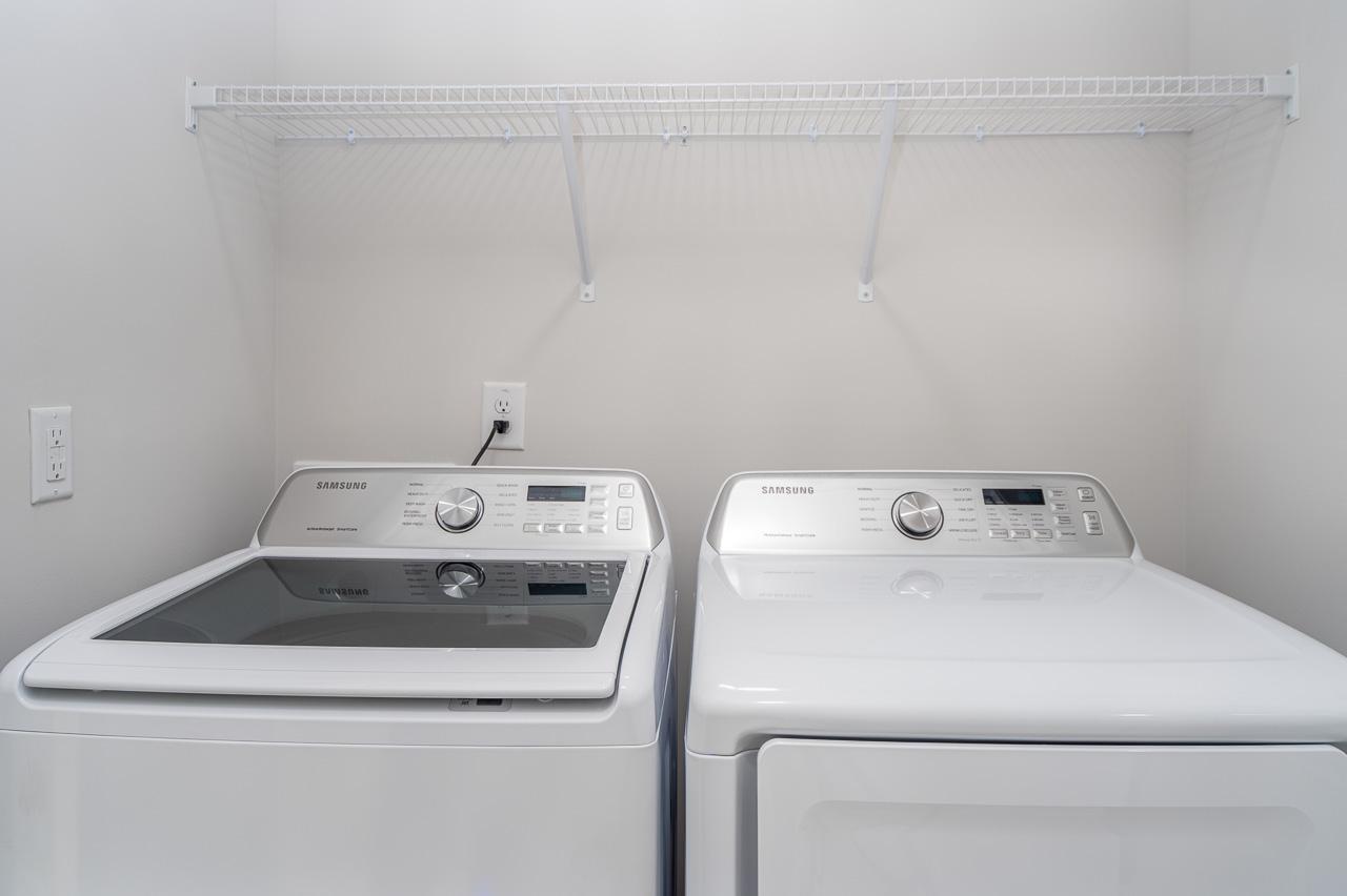 1434 Rosepine Drive Cary, NC 27519 - Photo 30 of 32 a utility room with dryer and washer
