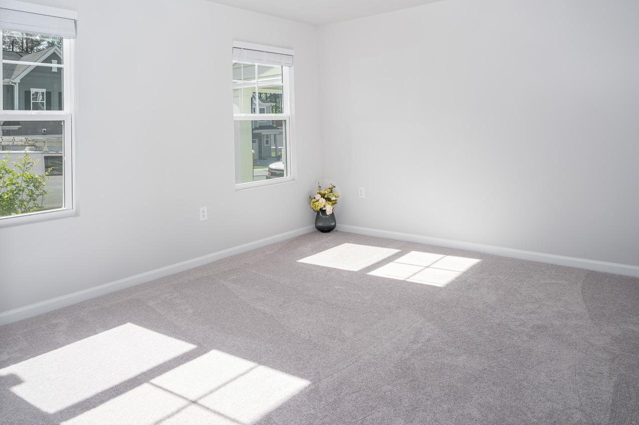1434 Rosepine Drive Cary, NC 27519 - Photo 3 of 32 an empty room with windows