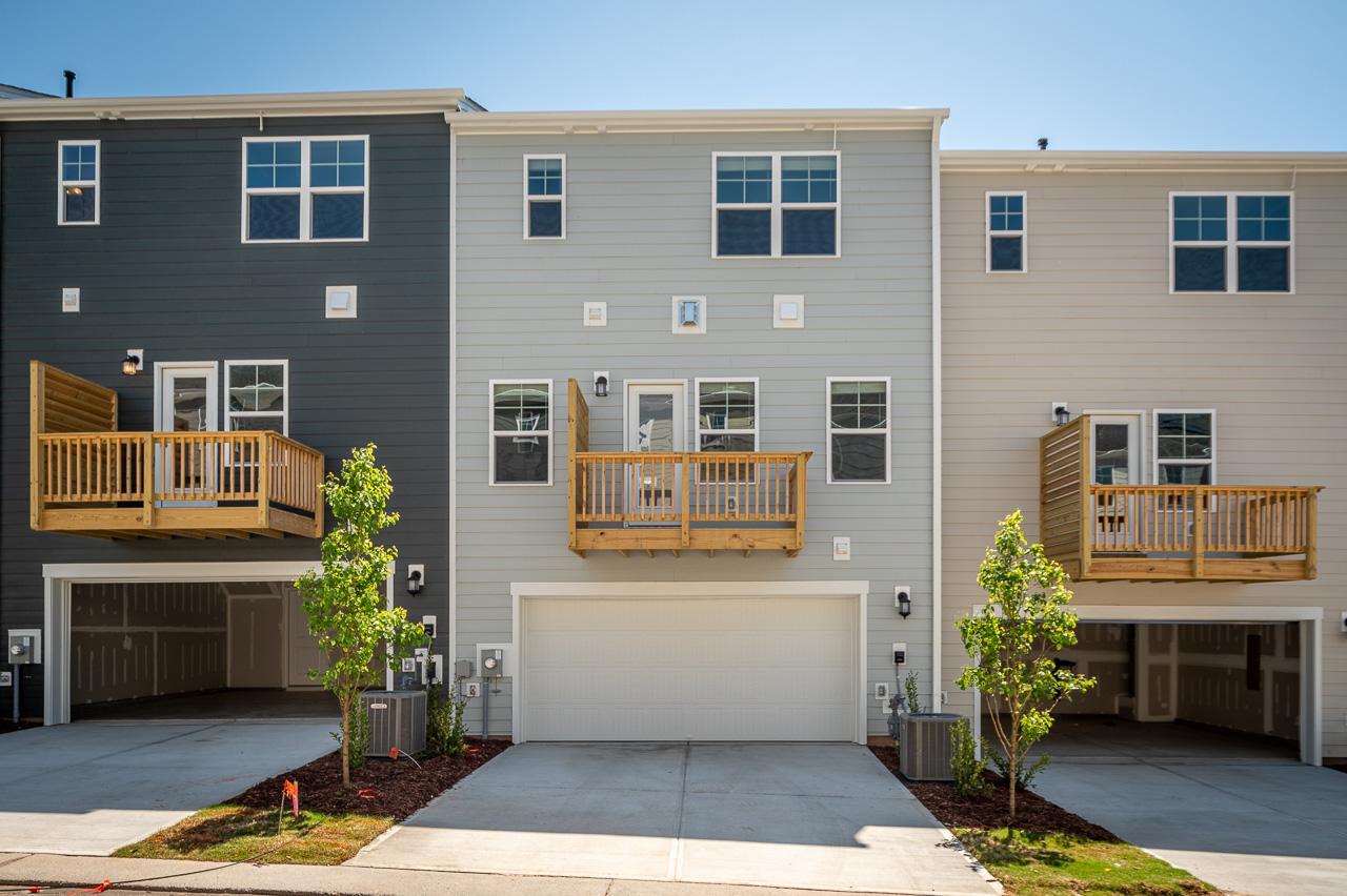1434 Rosepine Drive Cary, NC 27519 - Photo 31 of 32 a view of a house with a barbeque grill and couches chair