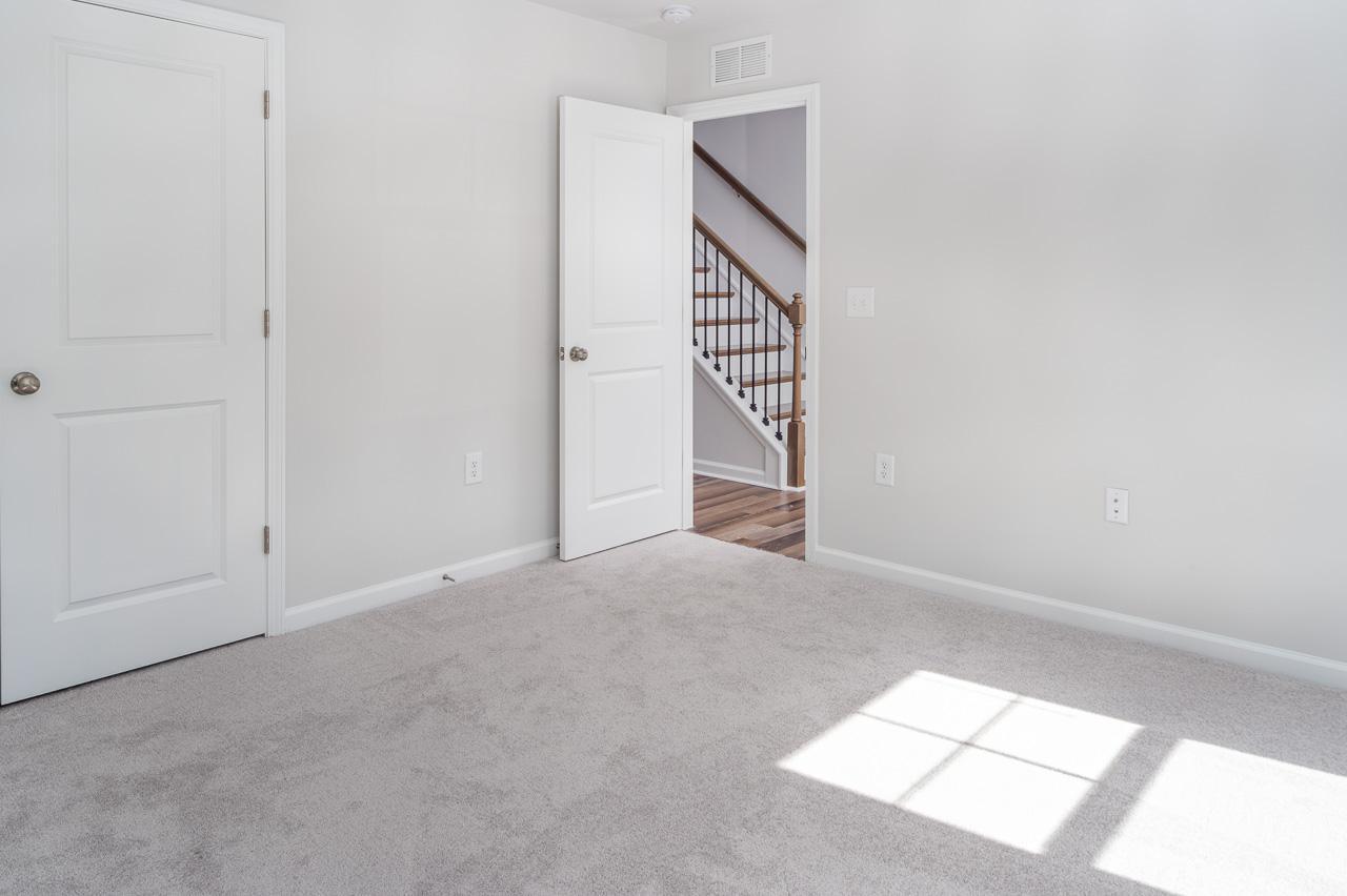 1434 Rosepine Drive Cary, NC 27519 - Photo 4 of 32 an empty room with windows