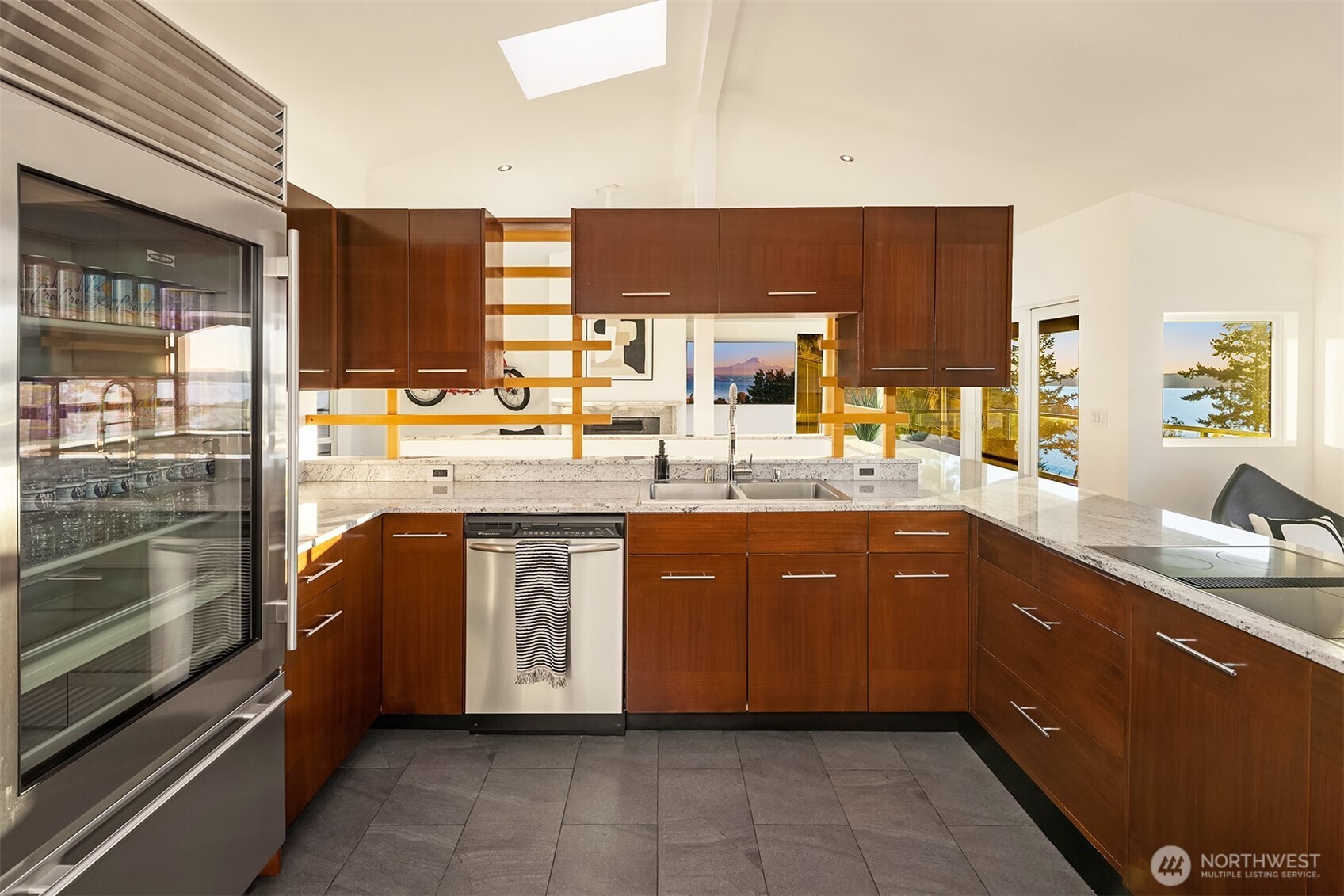 15733 25th Avenue Southwest Burien, WA 98166 - Photo 12 of 38 a kitchen with stainless steel appliances granite countertop a sink and stove
