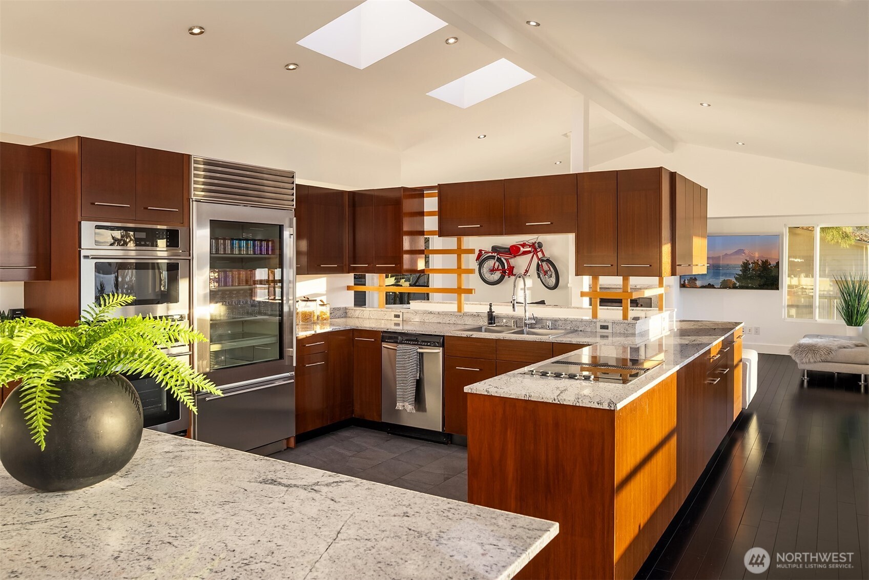 15733 25th Avenue Southwest Burien, WA 98166 - Photo 13 of 38 a kitchen with stainless steel appliances granite countertop a sink stove and refrigerator