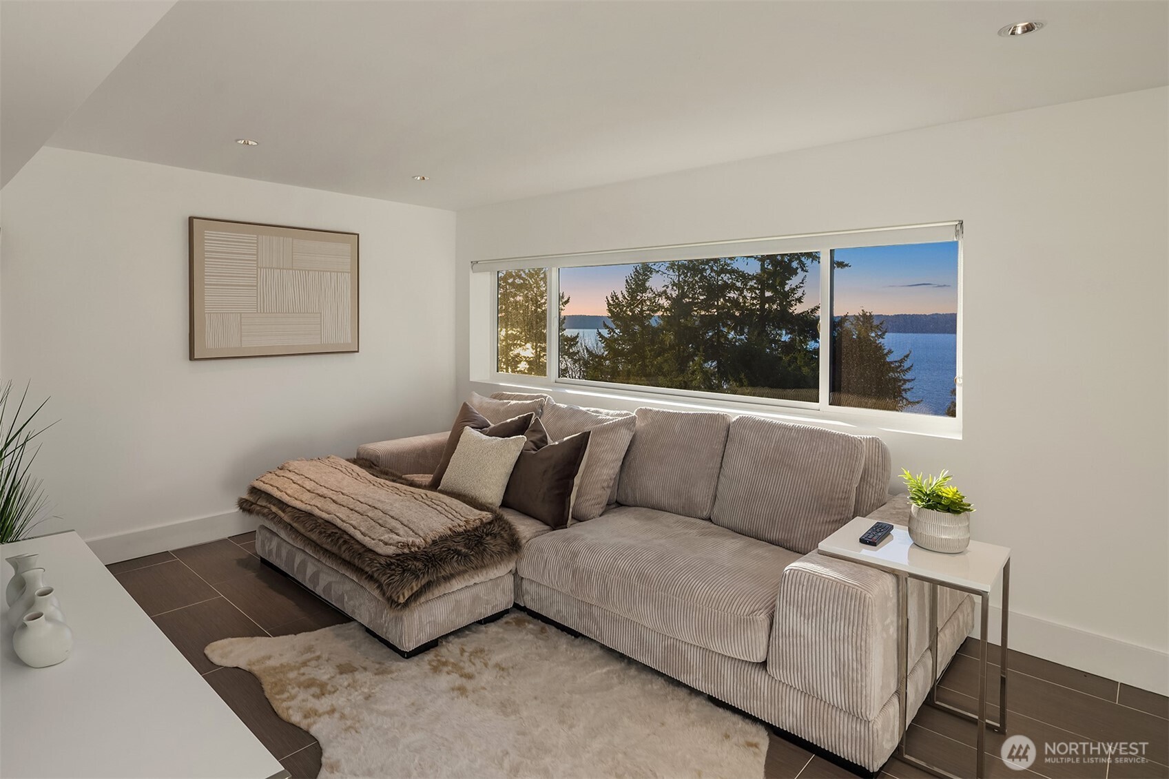 15733 25th Avenue Southwest Burien, WA 98166 - Photo 17 of 38 a living room with a couch and a window
