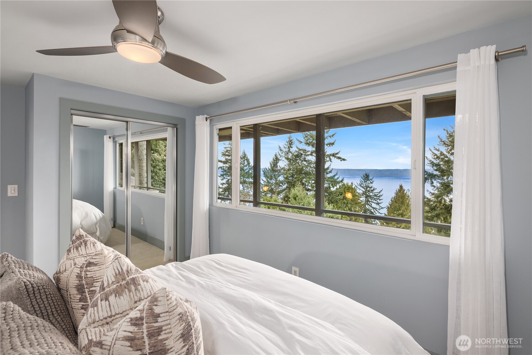 15733 25th Avenue Southwest Burien, WA 98166 - Photo 29 of 38 a bedroom with a large bed and a window