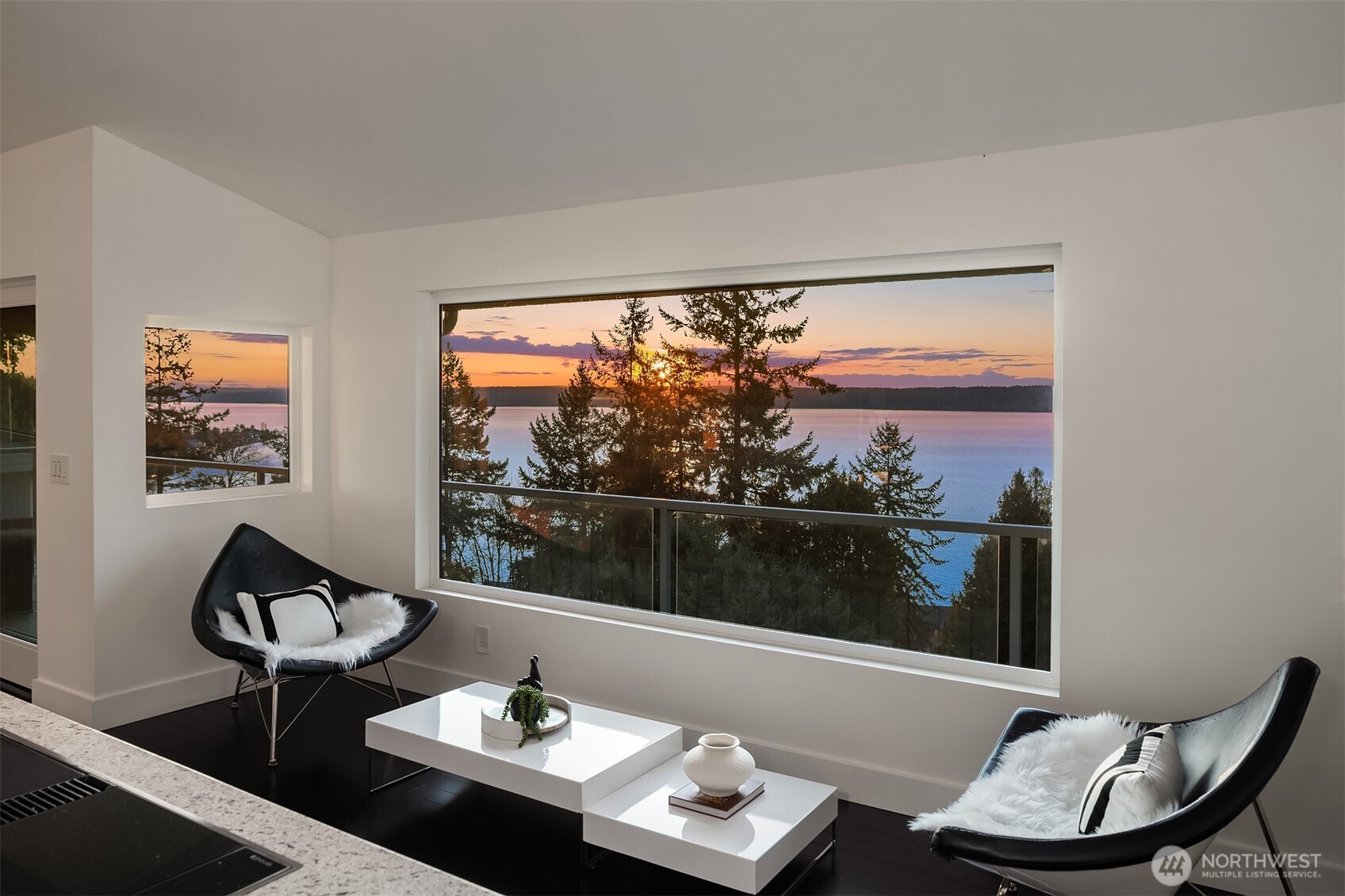 15733 25th Avenue Southwest Burien, WA 98166 - Photo 10 of 38 a living room with furniture and a large window