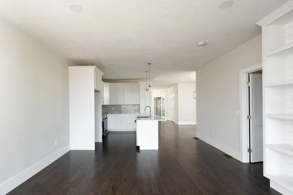 a view of kitchen with wooden floor